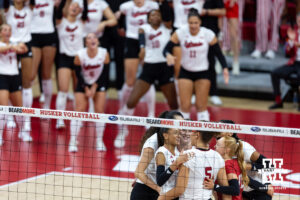 The Nebraska Cornhuskers celebrate a point against the Michigan Wolverines in the second set during a college volleyball match on Wednesday, September 24, 2025, in Lincoln, Nebraska. Photo by John S. Peterson.