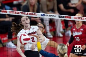 Nebraska Cornhusker Bergen Reilly (2) dunks the ball on Michigan Wolverine middle blocker Jenna Hanes (12) in the second set during a college volleyball match on Wednesday, September 24, 2025, in Lincoln, Nebraska. Photo by John S. Peterson.