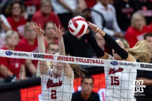 Nebraska Cornhusker Andi Jackson (15) blocks the ball against the Michigan Wolverines in the second set during a college volleyball match on Wednesday, September 24, 2025, in Lincoln, Nebraska. Photo by John S. Peterson.
