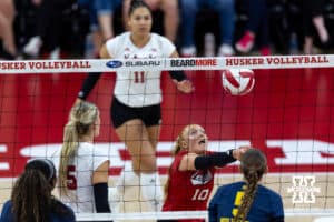 Nebraska Cornhusker Olivia Mauch (10) digs the ball against the Michigan Wolverines in the second set during a college volleyball match on Wednesday, September 24, 2025, in Lincoln, Nebraska. Photo by John S. Peterson.