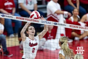 Nebraska Cornhusker Bergen Reilly (2) sets the ball against the Michigan Wolverines in the first set during a college volleyball match on Wednesday, September 24, 2025, in Lincoln, Nebraska. Photo by John S. Peterson.