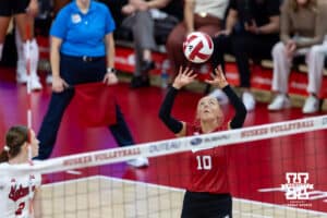 Nebraska Cornhusker Olivia Mauch (10) sets the ball against the Michigan Wolverines in the first set during a college volleyball match on Wednesday, September 24, 2025, in Lincoln, Nebraska. Photo by John S. Peterson.
