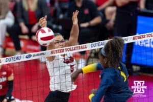 Nebraska Cornhusker Rebekah Allick (5) blocks Michigan Wolverine middle blocker Serena Nyambio (1) in the first set during a college volleyball match on Wednesday, September 24, 2025, in Lincoln, Nebraska. Photo by John S. Peterson.