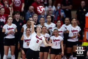 Nebraska Cornhusker Virginia Adriano (9) serves the ball against the Michigan Wolverines in the first set during a college volleyball match on Wednesday, September 24, 2025, in Lincoln, Nebraska. Photo by John S. Peterson.