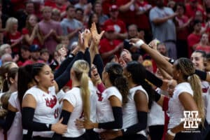 Nebraska Cornhuskers huddle up before taking on the Michigan Wolverines during a college volleyball match on Wednesday, September 24, 2025, in Lincoln, Nebraska. Photo by John S. Peterson.