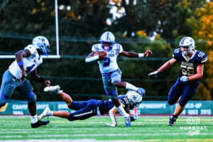 Boys Town's Shawn Lewis (2) running the ball for a first down during a high school football game @ Lincoln Lutheran on Thursday, September 18, 2025, in Lincoln, Nebraska. Photo By Jack Stephens.