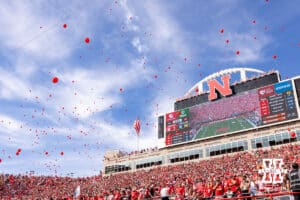 Husker fans release the balloons after the first Husker point during a college football game between Nebraska and Michigan on Saturday, September 20, 2025, in Lincoln, Nebraska. Photo by John S. Peterson.