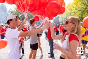 Huskers fans getting their balloons for the balloon release before Nebraska takes on Michigan during a college football game on Saturday, September 20, 2025, in Lincoln, Nebraska. Photo by John S. Peterson.