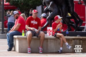 Husker fans enjoying a bite to eat before Nebraska takes on Michigan during a college football game on Saturday, September 20, 2025, in Lincoln, Nebraska. Photo by John S. Peterson.