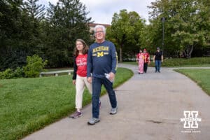 A couple walking around campus before Nebraska takes on Michigan during a college football game on Saturday, September 20, 2025, in Lincoln, Nebraska. Photo by John S. Peterson.
