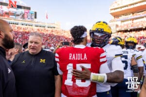Nebraska Cornhusker Dylan Raiola (15) hugs Michigan Wolverine Bryce Underwood (19) during a college football game on Saturday, September 20, 2025, in Lincoln, Nebraska. Photo by John S. Peterson.