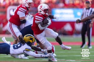 Nebraska Cornhusker Emmett Johnson (21) runs with the ball against the Michigan Wolverines during a college football game on Saturday, September 20, 2025, in Lincoln, Nebraska. Photo by John S. Peterson.
