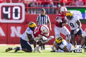 Nebraska Cornhusker Emmett Johnson (21) runs with with the ball against the Michigan Wolverines in the second quarter during a college football game on Saturday, September 20, 2025, in Lincoln, Nebraska. Photo by John S. Peterson.