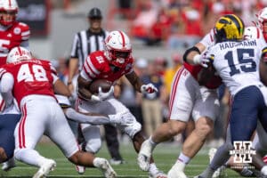 Nebraska Cornhusker Emmett Johnson (21) runs with the ball against the Michigan Wolverines during a college football game on Saturday, September 20, 2025, in Lincoln, Nebraska. Photo by John S. Peterson.