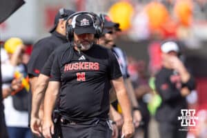 Nebraska Cornhusker defensive coordinator walking along the sideline against the Michigan Wolverines during a college football game on Saturday, September 20, 2025, in Lincoln, Nebraska. Photo by John S. Peterson.