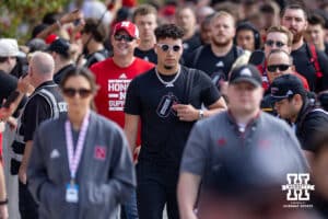 Nebraska Cornhusker Dylan Raiola (15) makes his way to the stadium at the Legacy Walk before a college football game against the Michigan Wolverines on Saturday, September 20, 2025, in Lincoln, Nebraska. Photo by John S. Peterson.