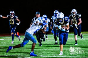 Lincoln Lutherans Evan Holle (25) runs for a first down during a high school football game against Boys Town on Thursday, September 18, 2025, in Lincoln, Nebraska. Photo By Jack Stephens.