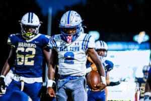 Boys Town's Shawn Lewis (2) flexing after a big rushing gain during a high school football game @ Lincoln Lutheran on Thursday, September 18, 2025, in Lincoln, Nebraska. Photo By Jack Stephens.