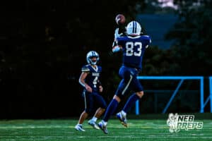 Lincoln Lutherans Henry Prokop (4) completing pass to Brayden Egge (83) during a high school football game against Boys Town on Thursday, September 18, 2025, in Lincoln, Nebraska. Photo By Jack Stephens.