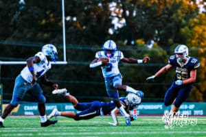 Boys Town's Shawn Lewis (2) running the ball for a first down during a high school football game against Lincoln Lutheran on Thursday, September 18, 2025, in Lincoln, Nebraska. Photo By Jack Stephens.