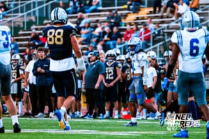 Boys Town Elijah Nhan (4) talking trash to Lincoln Lutheran Grant Kuhlmann (88) after breaking up a pass during a high school football game against Lincoln Lutheran on Thursday, September 18, 2025, in Lincoln, Nebraska. Photo By Jack Stephens.