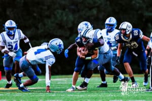 Lincoln Lutheran Henry Prokop (4) running through traffic during a high school football game against Lincoln Lutheran on Thursday, September 18, 2025, in Lincoln, Nebraska. Photo By Jack Stephens.