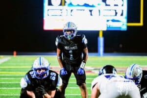 Millard North's Isaiah Traylor (1) gets set before a run play during the game VS Papio South on Friday, September 12, 2025, in Millard, Nebraska. Photo by Jack Stevens.