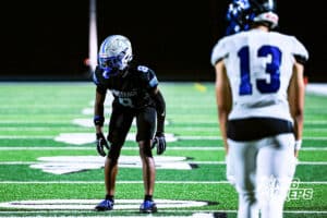 Millard North's Jaron Faughn (8) gets set to guard Papio South WR during the game VS Papio South on Friday, September 12, 2025, in Millard, Nebraska. Photo by Jack Stevens.