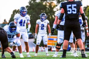 Papio Souths Derek Jones (2) gets set before a run play during the game at Millard North on Friday, September 12, 2025, in Millard, Nebraska. Photo by Jack Stevens.