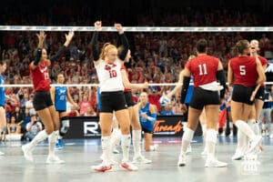 Nebraska Cornhuskers celebrate their win during a volleyball match against Creighton on Tuesday, September 16th, 2025 in Omaha, Nebraska. Photo by Brandon Tiedemann.
