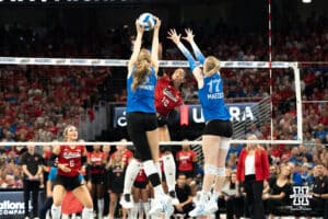 Nebraska Cornhusker Taylor Landfair (12) finds a seam and spikes the ball during a volleyball match against Creighton on Tuesday, September 16th, 2025 in Omaha, Nebraska. Photo by Brandon Tiedemann.