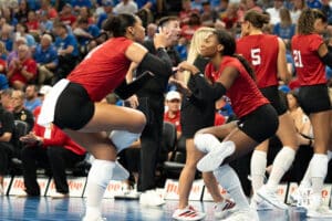 Nebraska Cornhuskers Teraya Sigler (11) and Ryan Hunter (18) celebrate on the bench during a volleyball match against Creighton on Tuesday, September 16th, 2025 in Omaha, Nebraska. Photo by Brandon Tiedemann.