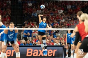 Creighton Bluejay Destiny Ndam-Simpson (18) serves during a volleyball match against Nebraska on Tuesday, September 16th, 2025 in Omaha, Nebraska. Photo by Brandon Tiedemann.