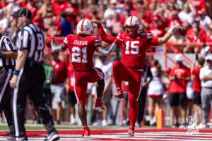 Nebraska Cornhusker Emmett Johnson (21) celebrates with Dylan Raiola (15) a touchdown in the second quarter against the Houston Christian Huskies during a college football game on Saturday, September 13, 2025, in Lincoln, Nebraska. Photo by John S. Peterson.