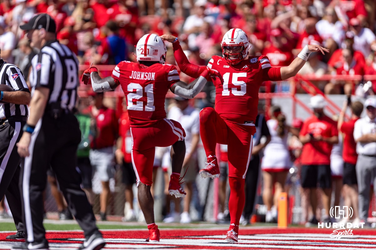Nebraska Cornhusker Emmett Johnson (21) celebrates with Dylan Raiola (15) a touchdown in the second quarter against the Houston Christian Huskies during a college football game on Saturday, September 13, 2025, in Lincoln, Nebraska. Photo by John S. Peterson.