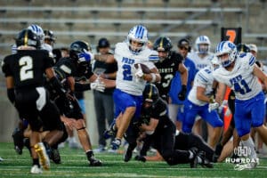 Creighton Prep runningback Angelo Wallker (2) blasts through a hole upfield during a high school football game, Friday, September 12th, 2025, Lincoln, Nebraska. Photo by Braden Cochran.