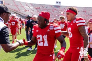 Nebraska Cornhuskers Emmett Johnson (21) heading back to the locker room with Dane Key after a college football game against the Houston Christian Huskies on Saturday, September 13, 2025, in Lincoln, Nebraska. Photo by John S. Peterson.