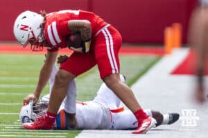 Nebraska Cornhusker TJ Lateef (14) stiff-arms Houston Christian Husky Xavier Toliver (1) to the ground in the third quarter during a college football game on Saturday, September 13, 2025, in Lincoln, Nebraska. Photo by John S. Peterson.
