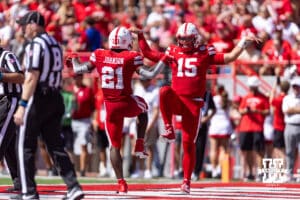 Nebraska Cornhusker Emmett Johnson (21) celebrates with Dylan Raiola (15) a touchdown in the second quarter against the Houston Christian Huskies during a college football game on Saturday, September 13, 2025, in Lincoln, Nebraska. Photo by John S. Peterson.