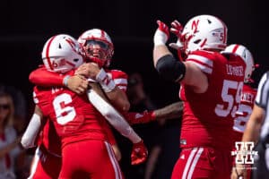 Nebraska Cornhusker Dylan Raiola (15) gives Dane Key (6) a hug after scoring a touchdown in the first quarter against the Houston Christian Huskies during a college football game on Saturday, September 13, 2025, in Lincoln, Nebraska. Photo by John S. Peterson.