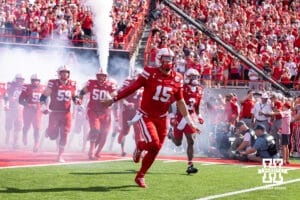 Nebraska Cornhusker Dylan Raiola (15) leads the Huskers out of the tunnel walk to take on the Houston Christian Huskies during a college football game on Saturday, September 13, 2025, in Lincoln, Nebraska. Photo by John S. Peterson.