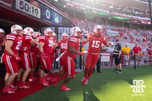 Nebraska Cornhusker Dylan Raiola (15) lead the team out to warm-ups before taking on the Houston Christian Huskies during a college football game on Saturday, September 13, 2025, in Lincoln, Nebraska. Photo by John S. Peterson.