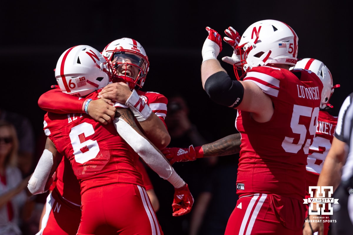 Nebraska Cornhusker Dylan Raiola (15) gives Dane Key (6) a hug after scoring a touchdown in the first quarter against the Houston Christian Huskies during a college football game on Saturday, September 13, 2025, in Lincoln, Nebraska. Photo by John S. Peterson.