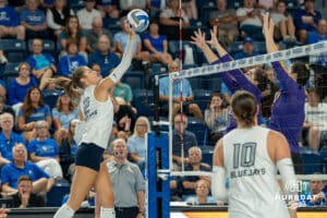 Creighton Bluejay Abbey Hayes (2) lifts the ball over a defender during a volleyball match against Northern Iowa on Sunday, September 14th, 2025 in Omaha, Nebraska. Photo by Brandon Tiedemann.