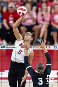 Nebraska Cornhusker Rebekah Allick (5) tips the ball over against Grand Canyon Lope Hayden Goodman (3) in the first set during a college volleyball match on Saturday, September 13, 2025, in Lincoln, Nebraska. Photo by John S. Peterson.