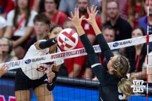Nebraska Cornhusker Skyler Pierce (21) spikes the ball against Grand Canyon Lope Macey Hughes (9) in the first set during a college volleyball match on Saturday, September 13, 2025, in Lincoln, Nebraska. Photo by John S. Peterson.