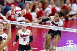 Nebraska Cornhusker Harper Murray (27) spikes the ball against the Utah Utes in the third set during a college volleyball match on Friday, September 12, 2025, in Lincoln, NE. Photo by John S. Peterson.