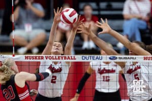 Nebraska Cornhuskers Bergen Reilly (2) and Rebekah Allick (5) block the ball against Utah Ute Neea-Maria Joki (20) in the first set during a college volleyball match on Friday, September 12, 2025, in Lincoln, NE. Photo by John S. Peterson.