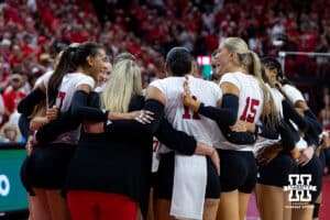Nebraska Cornhuskers huddle up before taking on the Utah Utes during a college volleyball match on Friday, September 12, 2025, in Lincoln, NE. Photo by John S. Peterson.