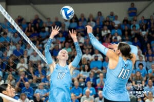 Creighton Bluejays Annalea Maeder (17) sets up a spike for Eloise Brandewie (10) during a volleyball match against Louisville on Friday, September 12th, 2025 in Omaha, Nebraska. Photo by Brandon Tiedemann.